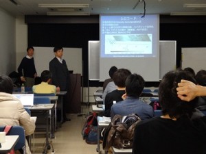 世話人の松本 洋介・千葉大学特任助教（左上）がpCANSについて講演を行う。すぐ右は座長を務める松元 亮治・千葉大学教授。